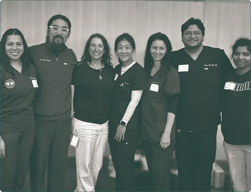 Street Wound Foundation and AAA Wound Care team members in scrubs standing together at the Street Medicine Summit